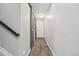 Hallway with wood-look tile and a sliding barn door at 2633 Garganey Dr, Castle Rock, CO 80104
