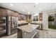 Granite counters accent this kitchen with stainless appliances and a large island, perfect for food preparation at 2633 Garganey Dr, Castle Rock, CO 80104