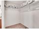 Walk-in closet with shelving and ample storage space at 567 Solano Dr, Brighton, CO 80603