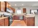 Well-equipped kitchen featuring ample counter space at 567 Solano Dr, Brighton, CO 80603