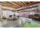 Spacious unfinished basement, highlighting the structural beams and layout at 17464 Crestview Ct, Monument, CO 80132