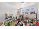 Spacious bedroom with hardwood floors and three windows at 17464 Crestview Ct, Monument, CO 80132