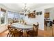 Charming dining room with a large window offering scenic views and seating for six at 17464 Crestview Ct, Monument, CO 80132