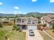 Inviting two-story home showcasing meticulous landscaping and attached two-car garage at 17464 Crestview Ct, Monument, CO 80132