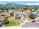 Charming suburban home with lush landscaping, complemented by a scenic mountain backdrop at 17464 Crestview Ct, Monument, CO 80132