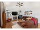 Comfortable living room with a fireplace, built-in shelves, and stylish decor at 17464 Crestview Ct, Monument, CO 80132