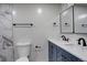 Modern bathroom featuring a double sink vanity and marble accent wall at 1925 Syracuse St, Denver, CO 80220