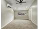 Neutral bedroom with a ceiling fan, window, and carpet flooring at 1925 Syracuse St, Denver, CO 80220