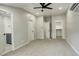 Spacious bedroom with carpet flooring and a walk-in closet at 1925 Syracuse St, Denver, CO 80220