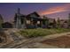 Charming single-Gathering home with a well-manicured lawn and an inviting covered front porch at 2659 Ash St, Denver, CO 80207