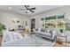 Comfortable living room with a modern design, large windows, and hardwood floors at 2659 Ash St, Denver, CO 80207