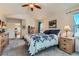 Cozy primary bedroom offers ample natural light, neutral tones and comfortable carpeting at 13962 Dexter Way, Thornton, CO 80602