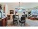 Inviting dining room featuring a glass table and comfortable seating at 13962 Dexter Way, Thornton, CO 80602