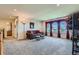 Bright living room with comfortable seating, ample natural light, and stylish decor at 13962 Dexter Way, Thornton, CO 80602