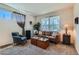 Cozy living room featuring neutral walls, carpet, and comfortable furnishings at 13962 Dexter Way, Thornton, CO 80602