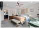 Bedroom with a bed, dresser, and a desk area at 4078 Happy Hollow Dr, Castle Rock, CO 80104