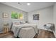 Bright bedroom with hardwood floors and neutral tones at 957 Newton St, Denver, CO 80204