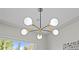 Chic lighting fixture providing warm light and modern look, perfect for adding style to any room at 957 Newton St, Denver, CO 80204