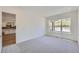 Bright bedroom with plush carpeting, natural light, and neutral walls at 20 Leafy Aster Ln, Castle Rock, CO 80104
