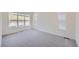 Bright bedroom with plush carpeting, natural light, and neutral walls at 20 Leafy Aster Ln, Castle Rock, CO 80104