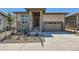 Charming single-Gathering home featuring stone accents, landscaped front yard, and an attached two-car garage at 20 Leafy Aster Ln, Castle Rock, CO 80104