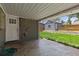 View of the covered backyard patio with string lights at 4451 Eliot St, Denver, CO 80211