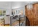Beautiful living room with hardwood floors, large windows, and modern decor at 4451 Eliot St, Denver, CO 80211