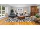 Inviting living room with hardwood floors, lots of natural light, and comfortable seating arrangements at 4451 Eliot St, Denver, CO 80211