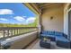Balcony features a comfortable seating area and a view of the neighborhood at 8445 S Holland Way # 205, Littleton, CO 80128