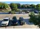 Parking lot view with pool in the distance at 8445 S Holland Way # 205, Littleton, CO 80128