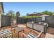 Backyard showcasing patio with seating, a small pool, and privacy fencing at 947 S Yates St, Denver, CO 80219