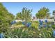 Inviting garden with vibrant blue irises and lush greenery at 947 S Yates St, Denver, CO 80219