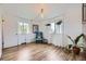 Cozy living room showcasing hardwood floors, natural light, and stylish decor at 947 S Yates St, Denver, CO 80219