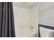 Bathroom features a tub with a shower and a toilet at 7665 E Eastman Ave # 210, Denver, CO 80231