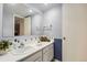 A bathroom featuring ample counter space and cabinet storage at 7665 E Eastman Ave # 210, Denver, CO 80231