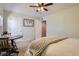 This bedroom provides a comfortable and relaxing space with natural light at 7665 E Eastman Ave # 210, Denver, CO 80231