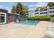 Refreshing outdoor pool is surrounded by a patio, and lounge chairs, and offers a relaxing retreat at 7665 E Eastman Ave # 210, Denver, CO 80231