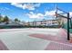 Multi-purpose courts for tennis and basketball, offering recreational options with surrounding buildings at 7665 E Eastman Ave # 210, Denver, CO 80231