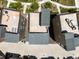 Aerial view of rooftops featuring outdoor lounge areas, and modern architectural design at 3654 Penang Dr, Castle Rock, CO 80109