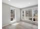 Sunlit bedroom with large windows and modern blinds at 3654 Penang Dr, Castle Rock, CO 80109