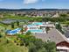 Overhead view of the expansive community pool area, complete with slides and many lounge areas at 3654 Penang Dr, Castle Rock, CO 80109