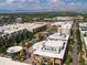 Aerial shot capturing a bustling shopping district with stores, restaurants, and ample parking at 453 S Quay Street, Lakewood, CO 80226