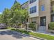 Townhouse exterior with manicured landscaping, sidewalk, and clear signage at 453 S Quay Street, Lakewood, CO 80226