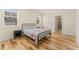 Bright bedroom with hardwood floors and large windows at 671 Robert St, Longmont, CO 80503