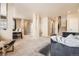 Spacious living room with plush carpeting, neutral walls, and comfortable seating at 12185 S Grass River Trl, Parker, CO 80134