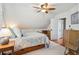 Comfortable bedroom with a ceiling fan and neutral decor at 434 N Washington St, Denver, CO 80203