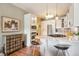 Bright kitchen with white cabinets, granite countertops, stainless steel appliances, and modern pendant lighting at 434 N Washington St, Denver, CO 80203