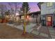 Inviting backyard with a fire pit, seating area, and cozy ambiance at 8229 Marshall Ct, Arvada, CO 80003
