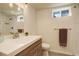 Bathroom featuring modern vanity, neutral paint and natural lighting at 8229 Marshall Ct, Arvada, CO 80003