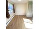 Cozy bedroom with lots of natural light and new laminate floors at 7309 W Hampden Ave # 5202, Lakewood, CO 80227